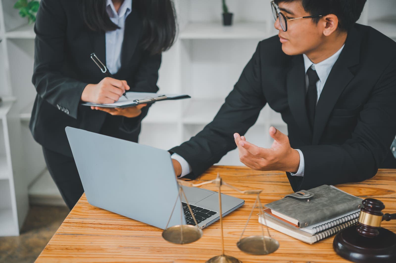 Ohio business owners working through a matter with their attorney